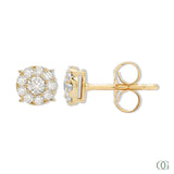 A pair of dainty round diamond earrings with a gold-tone band and a total weight of 0.45 carats.