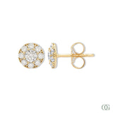 A pair of sparkling round diamond earrings with a gold-tone band and white gold mounting.